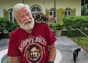 Wally Collins poses in front of the Ernest Hemingway Home & Museum Sunday, July 20, 2014, in Key West, Fla. Collins, a Phoenix restaurateur, won the 2014 "Papa" Hemingway Look-Alike Contest late Saturday, July 19, at Sloppy Joe's Bar.  The competition was a highlight of Key West's annual Hemingway Days festival that concludes Sunday. FOR EDITORIAL USE ONLY (Andy Newman/Florida Keys News Bureau/HO)